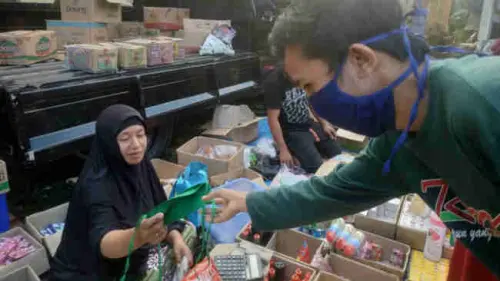 Di Pasar Desa, KP2K Beraksi Cegah Penyebaran Covid-19